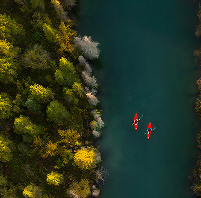 Aerial view of kayaks on lake